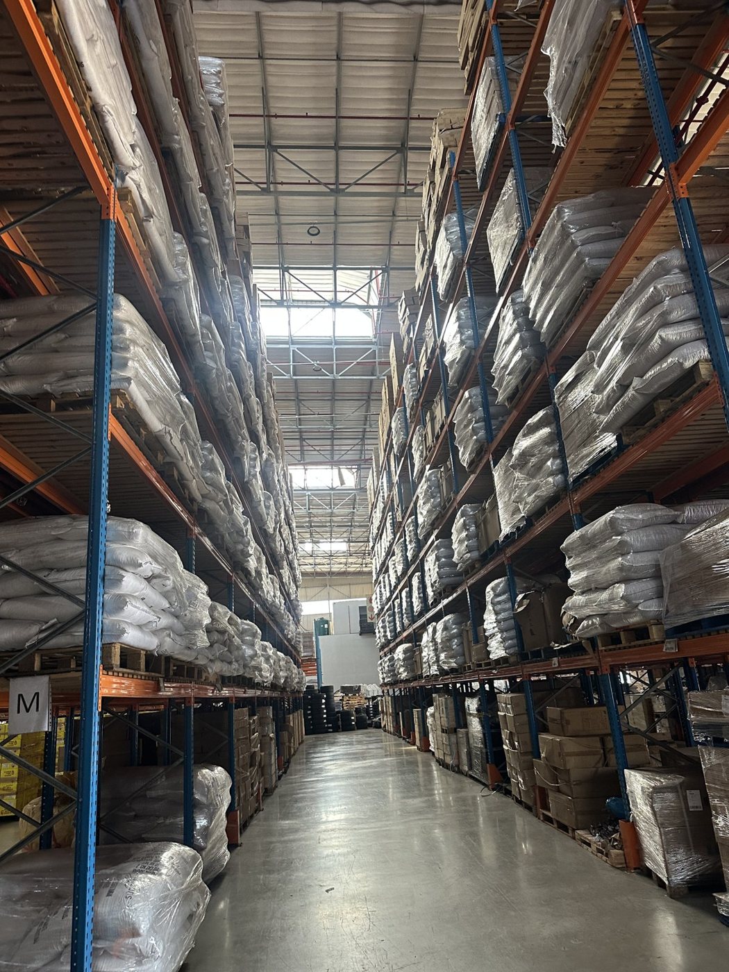 Racked warehouse holding Kay Curzi Group stock